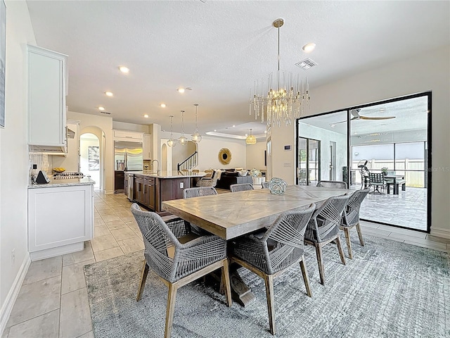 18203 Pine Hammock Blvd, Lutz, FL 33548 - dining area with recessed lighting, arched walkways, a chandelier, baseboards, and a ceiling fan