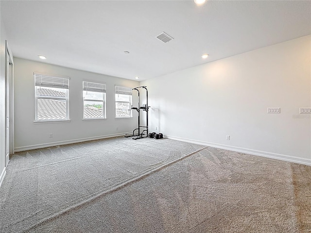 18203 Pine Hammock Blvd, Lutz, FL 33548 - exercise area with carpet floors, baseboards, and recessed lighting