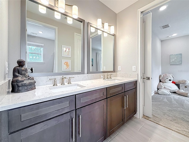 18203 Pine Hammock Blvd, Lutz, FL 33548 - bathroom featuring double vanity
