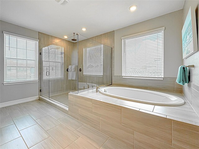 18203 Pine Hammock Blvd, Lutz, FL 33548 - bathroom featuring a garden tub, a shower stall, tile patterned floors, and recessed lighting