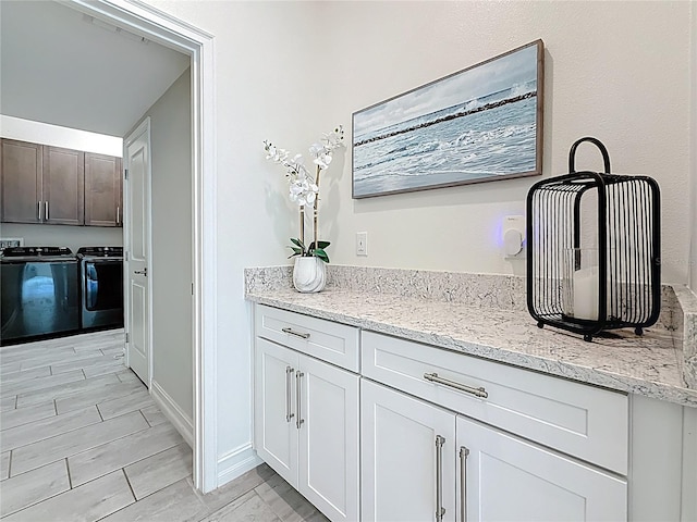 18203 Pine Hammock Blvd, Lutz, FL 33548 - bar featuring washing machine and dryer
