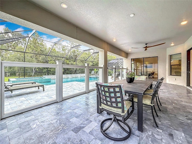 18203 Pine Hammock Blvd, Lutz, FL 33548 - view of patio with ceiling fan, a lanai, a pool with connected hot tub, and outdoor dining area