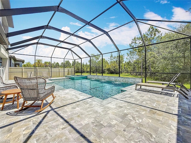 18203 Pine Hammock Blvd, Lutz, FL 33548 - view of swimming pool featuring a pool with connected hot tub, a patio, and glass enclosure