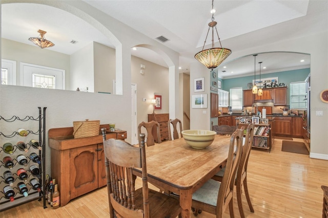 1326 Apollo Beach Blvd S, Apollo Beach, FL 33572 - dining room with arched walkways, visible vents, light wood-style flooring, and recessed lighting