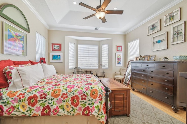 1326 Apollo Beach Blvd S, Apollo Beach, FL 33572 - bedroom featuring visible vents, multiple windows, ornamental molding, and light wood-style floors