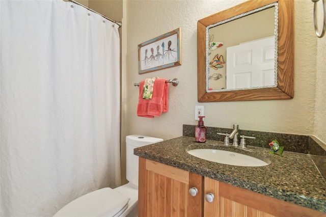 1326 Apollo Beach Blvd S, Apollo Beach, FL 33572 - bathroom featuring vanity, a textured wall, a shower with shower curtain, and toilet