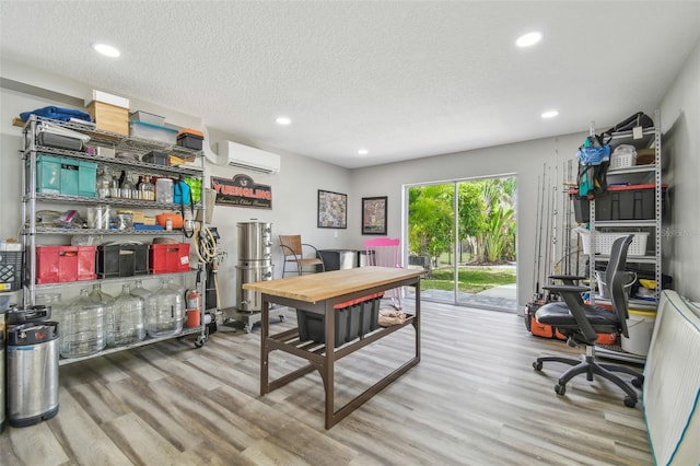 1326 Apollo Beach Blvd S, Apollo Beach, FL 33572 - office space with an AC wall unit, a textured ceiling, recessed lighting, and wood finished floors