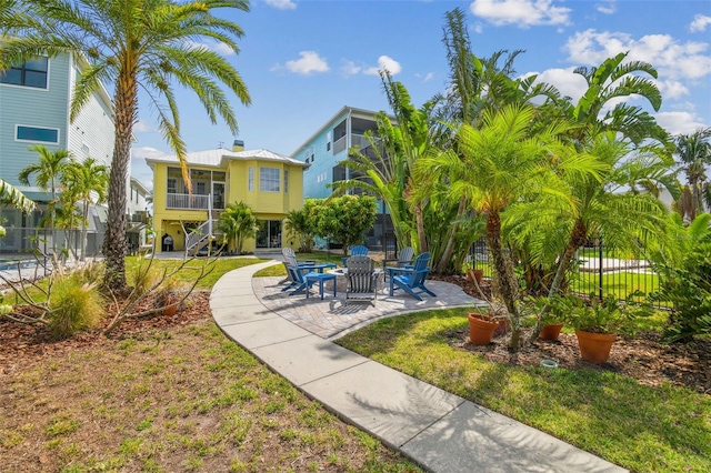 1326 Apollo Beach Blvd S, Apollo Beach, FL 33572 - view of community with a patio, a yard, fence, and stairs