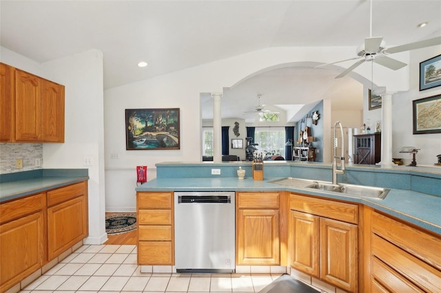 kitchen featuring a sink, a ceiling fan, decorative columns, and dishwasher