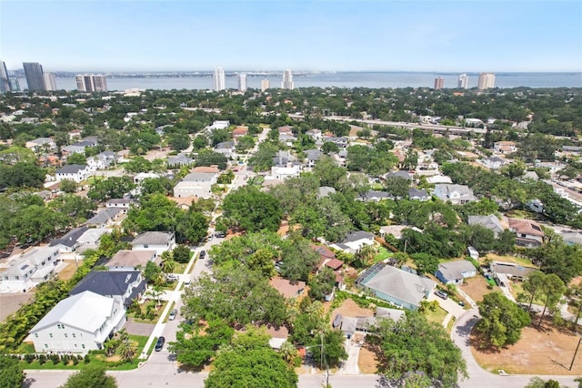 bird's eye view with a water view and a residential view