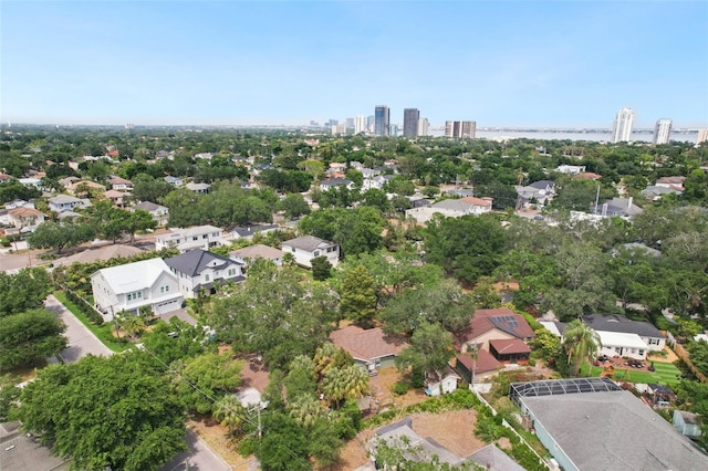 birds eye view of property with a view of city