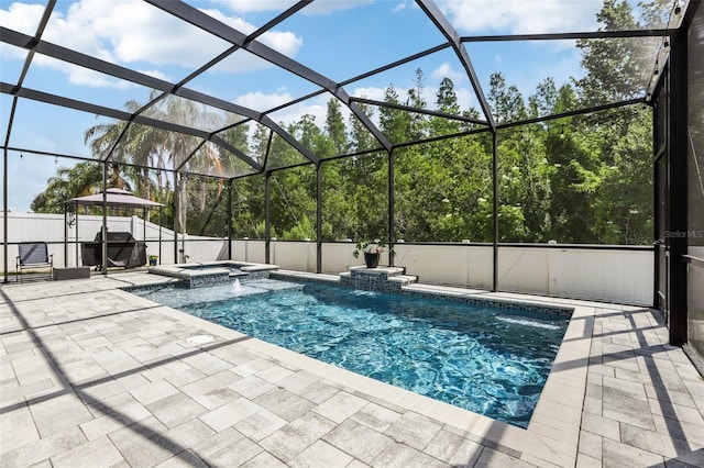 3046 Donington Castle Ln, Land O Lakes, FL 34638 - view of pool with a patio and a pool with connected hot tub