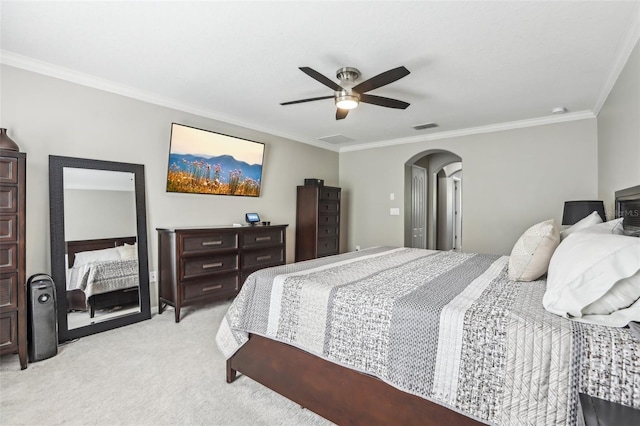 3046 Donington Castle Ln, Land O Lakes, FL 34638 - bedroom featuring light colored carpet, arched walkways, crown molding, and ceiling fan