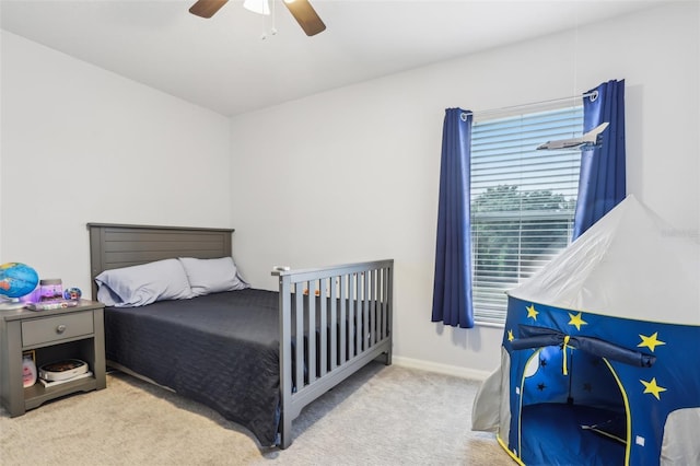 3046 Donington Castle Ln, Land O Lakes, FL 34638 - carpeted bedroom with ceiling fan and baseboards