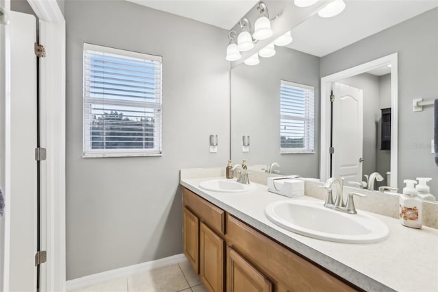 3046 Donington Castle Ln, Land O Lakes, FL 34638 - full bath with tile patterned flooring, double vanity, and baseboards