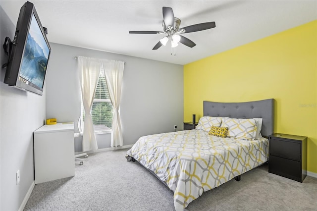 3046 Donington Castle Ln, Land O Lakes, FL 34638 - carpeted bedroom featuring baseboards and a ceiling fan