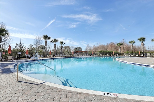 3046 Donington Castle Ln, Land O Lakes, FL 34638 - community pool featuring fence