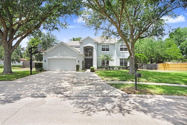 808 Hickory Glen Dr, Seffner, FL 33584 - view of front of property featuring a garage, driveway, and stucco siding