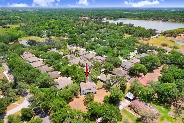 808 Hickory Glen Dr, Seffner, FL 33584 - aerial perspective of suburban area with a nearby body of water and a forest