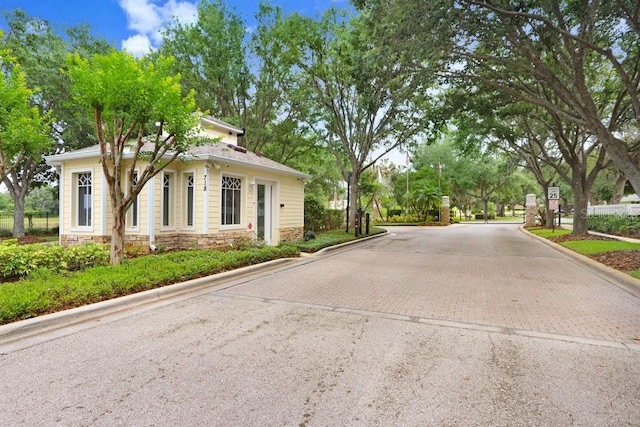 808 Hickory Glen Dr, Seffner, FL 33584 - view of road with curbs and a gated entry