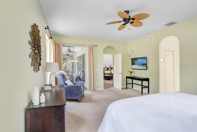 808 Hickory Glen Dr, Seffner, FL 33584 - bedroom with arched walkways, access to exterior, carpet floors, and ceiling fan