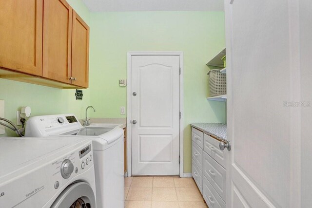 808 Hickory Glen Dr, Seffner, FL 33584 - washroom featuring cabinet space, washing machine and dryer, and light tile patterned flooring