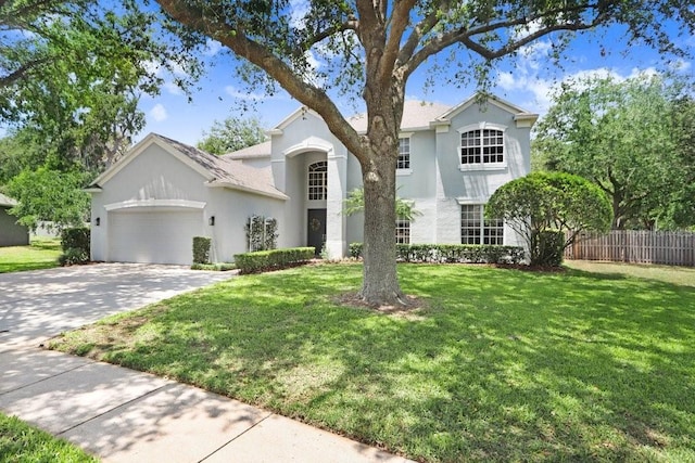808 Hickory Glen Dr, Seffner, FL 33584 - view of front of house featuring an attached garage, stucco siding, and driveway