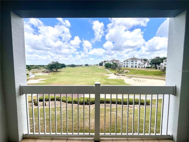 7673 Heritage Crossing Way Unit 202, Reunion, FL 34747 - balcony featuring view of golf course
