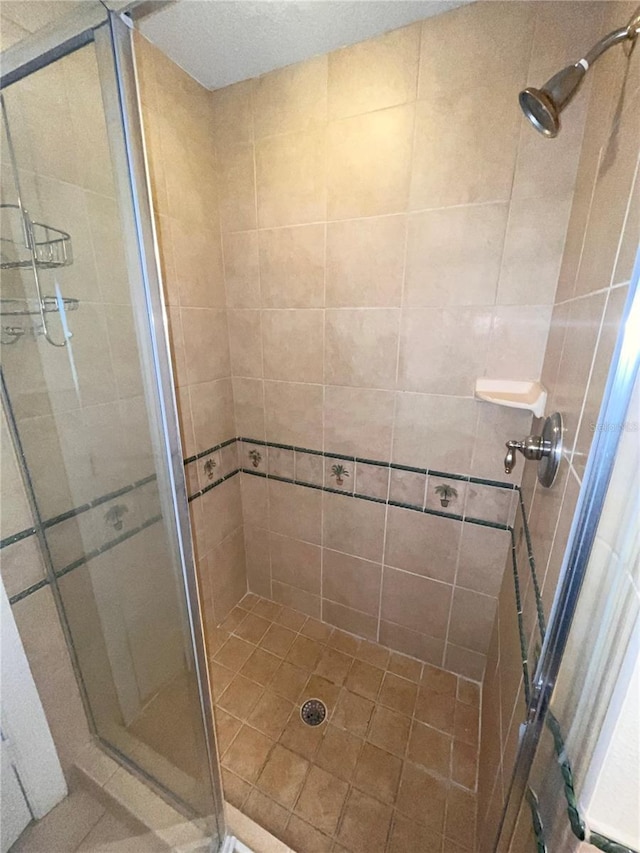 7673 Heritage Crossing Way Unit 202, Reunion, FL 34747 - full bathroom featuring a shower stall