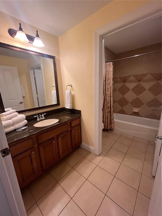 7673 Heritage Crossing Way Unit 202, Reunion, FL 34747 - bathroom with vanity, toilet, baseboards, shower / bathtub combination with curtain, and tile patterned floors