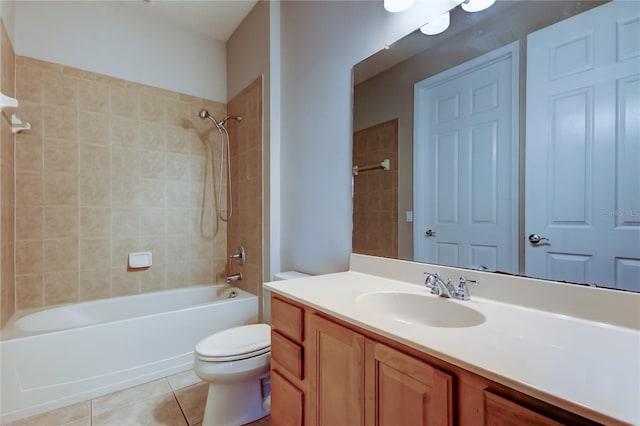 bathroom with tile patterned floors, vanity, toilet, and tub / shower combination