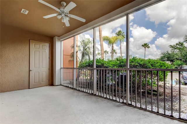 unfurnished sunroom with visible vents and a healthy amount of sunlight