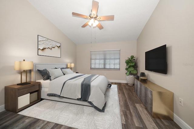 2170 Elm St Unit 906, Dunedin, FL 34698 - bedroom with a ceiling fan, baseboards, wood finished floors, and lofted ceiling