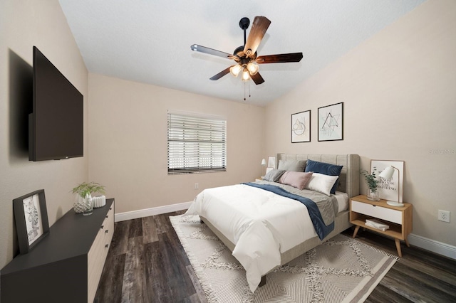 2170 Elm St Unit 906, Dunedin, FL 34698 - bedroom with dark wood-type flooring, baseboards, ceiling fan, and lofted ceiling