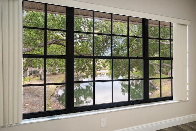 2170 Elm St Unit 906, Dunedin, FL 34698 - room details featuring a water view and baseboards