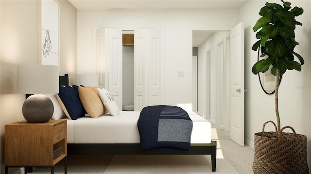 bedroom featuring light carpet
