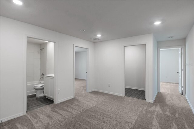 587 Bay Leaf Dr, Poinciana, FL 34759 - unfurnished bedroom featuring baseboards, carpet flooring, recessed lighting, and visible vents