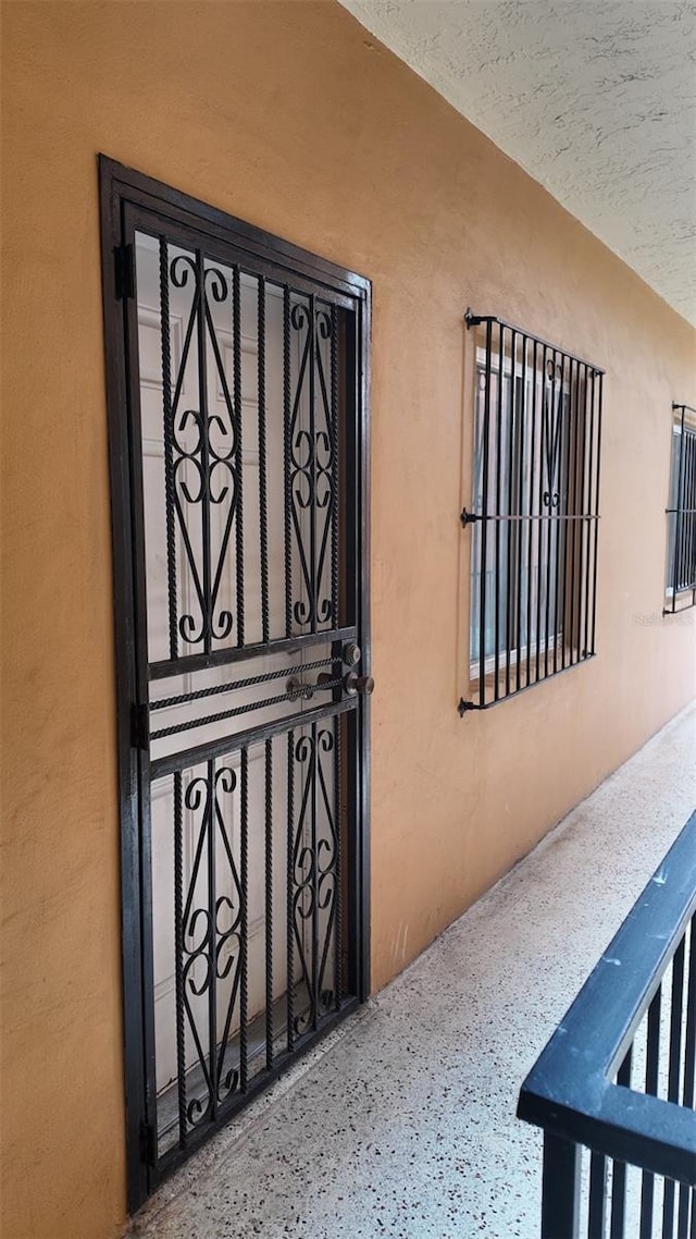 2921 SW 10th St Unit 23, Miami, FL 33135 - view of exterior entry featuring stucco siding