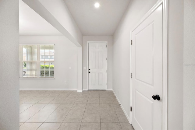 8595 Prairie Creek Dr, New Port Richey, FL 34655 - foyer featuring baseboards and light tile patterned floors