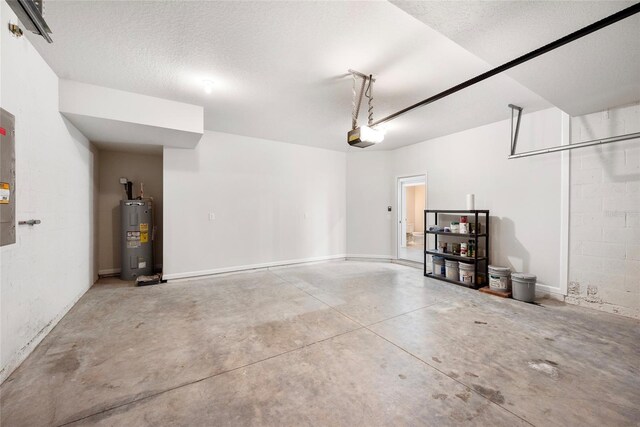 8595 Prairie Creek Dr, New Port Richey, FL 34655 - garage featuring electric water heater and a garage door opener