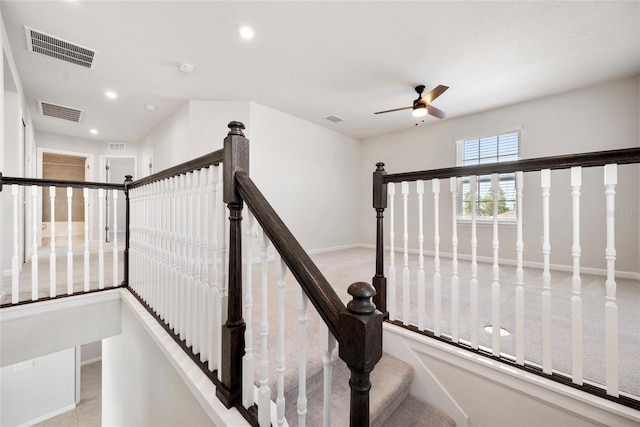 8595 Prairie Creek Dr, New Port Richey, FL 34655 - staircase featuring ceiling fan, recessed lighting, and baseboards