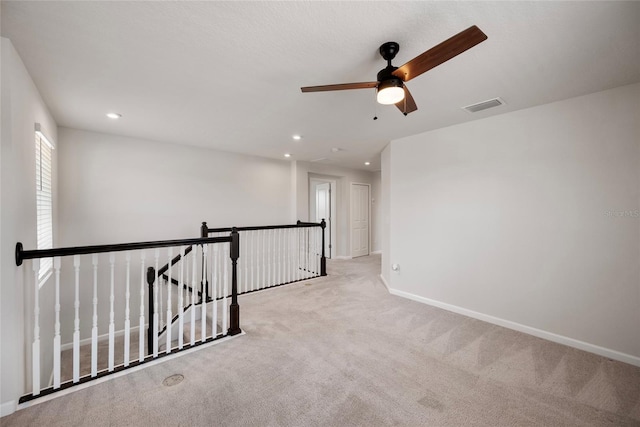 8595 Prairie Creek Dr, New Port Richey, FL 34655 - carpeted empty room with ceiling fan, baseboards, and recessed lighting