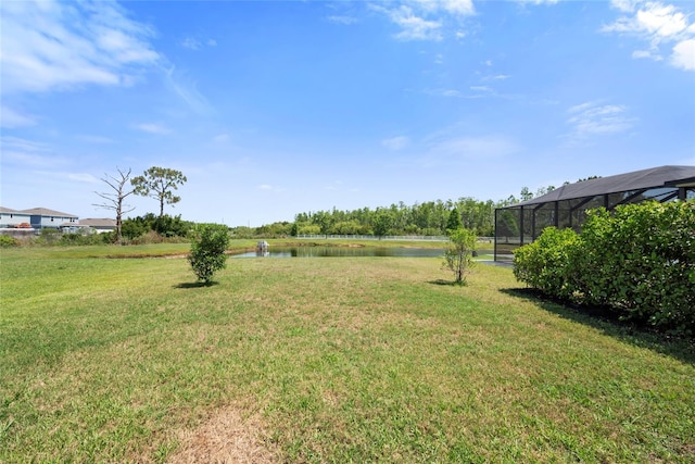 8595 Prairie Creek Dr, New Port Richey, FL 34655 - view of grassy yard with a water view