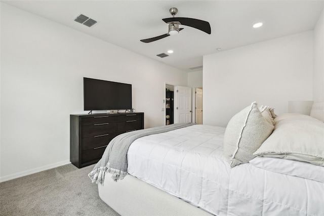 carpeted bedroom featuring baseboards, recessed lighting, and ceiling fan
