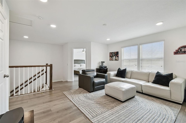 living room featuring light wood-style floors, recessed lighting, and a ceiling fan