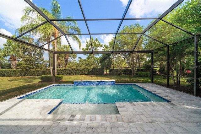 pool featuring a patio, glass enclosure, and a lawn