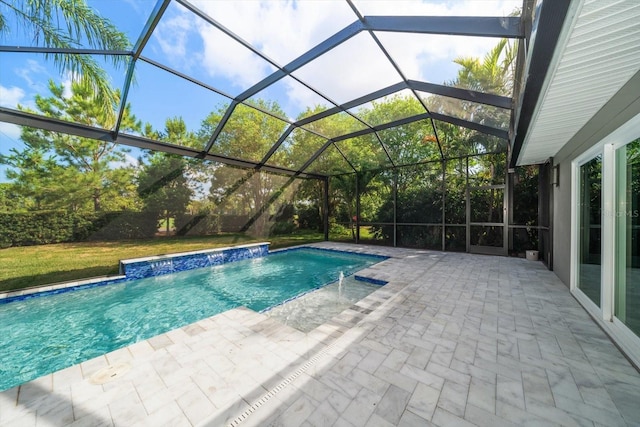 outdoor pool with a lanai and a patio