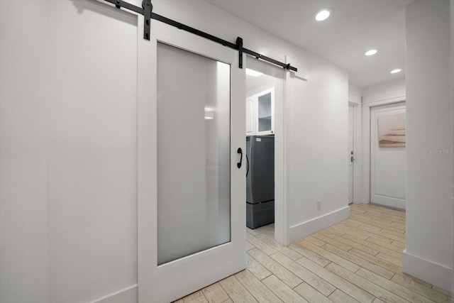 bathroom featuring recessed lighting, baseboards, and wood finished floors