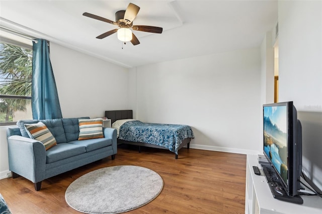 2615 Cove Cay Dr Unit 409, Clearwater, FL 33760 - bedroom with baseboards, ceiling fan, visible vents, and wood finished floors