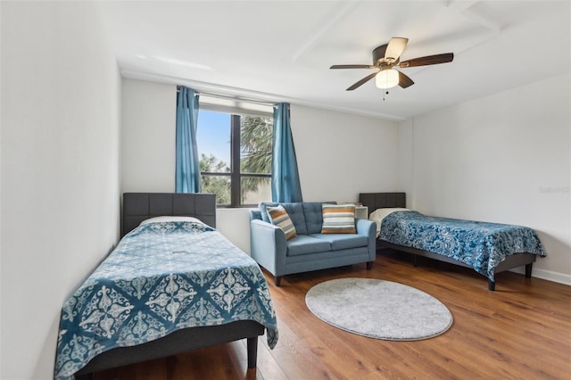 2615 Cove Cay Dr Unit 409, Clearwater, FL 33760 - bedroom featuring ceiling fan and wood finished floors